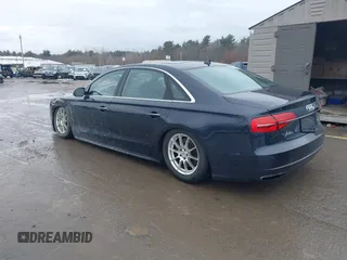 2017 Audi A8 L Sport with VIN WAU43AFDXHN003685, listed as a IAAI auction lot 41264314 with 114,828 mi miles. Bid and sale history available at carsss.com. Image 3.