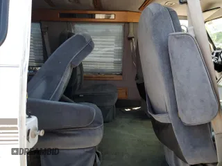 1995 Chevrolet Chevy Van z VIN 1GBEG25H0SF243534, wystawiony jako Copart lot #64175964 z przebiegiem 134 916 mil mil oraz Szkoda całkowita • Salvage title. Historia ofert i sprzedaży dostępna na DreamBid. Obrazek 11.