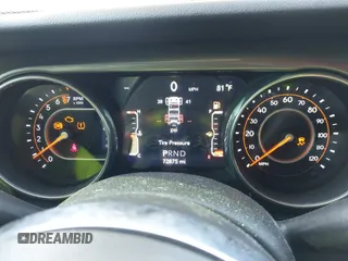 2018 Jeep Wrangler Unlimited Sahara z VIN 1C4HJXEG3JW175226, wystawiony jako IAAI lot #42307456 z przebiegiem 72 875 mil mil oraz . Historia ofert i sprzedaży dostępna na DreamBid. Obrazek 7.