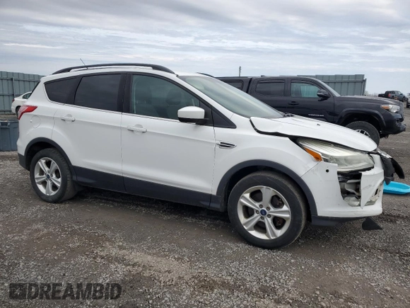 2015 Ford Escape SE with VIN 1FMCU9GX0FUB83597, listed as a Copart auction lot 52641005 with 200,835 mi miles and Salvage Title. Bid and sale history available at carsss.com. Image 4.