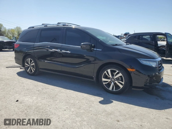 2021 Honda Odyssey Touring with VIN 5FNRL6H80MB036564, listed as a Copart auction lot 52218215 with 44,556 mi miles and Salvage Title. Bid and sale history available at carsss.com. Image 4.