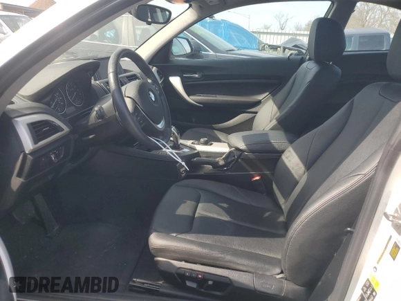 2015 BMW 2 Series 228i xDrive with VIN WBA1F7C57FV367618, listed as a Copart auction lot 49160985 with 63,457 mi miles and Salvage Title. Bid and sale history available at carsss.com. Image 7.