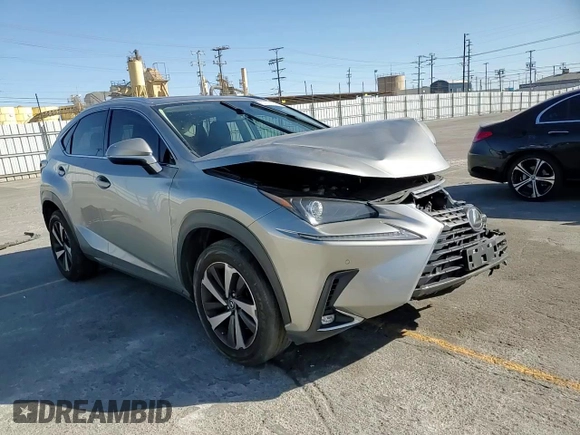 2021 Lexus NX 300 with VIN JTJGARBZ7M2191564, listed as a Copart auction lot 57974155 with 52,499 mi miles and Salvage title. Bid and sale history available at DreamBid. Image 14.