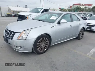 2013 Cadillac CTS Performance with VIN 1G6DJ5E32D0175793, listed as a IAAI auction lot 41885572 with 109,243 mi miles and . Bid and sale history available at DreamBid. Image 2.