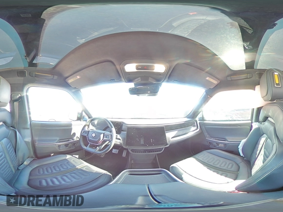 2023 Rivian R1S Adventure z VIN 7PDSGABA3PN018823, wystawiony jako Copart lot #53184595 z przebiegiem 36 677 mil mil oraz Szkoda całkowita • Salvage title. Historia ofert i sprzedaży dostępna na DreamBid. Obrazek 13.