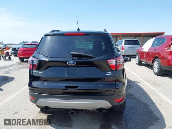 2017 Ford Escape SE with VIN 1FMCU9GD4HUE72510, listed as a IAAI auction lot 41932364 with 115,991 mi miles. Bid and sale history available at carsss.com. Image 16.