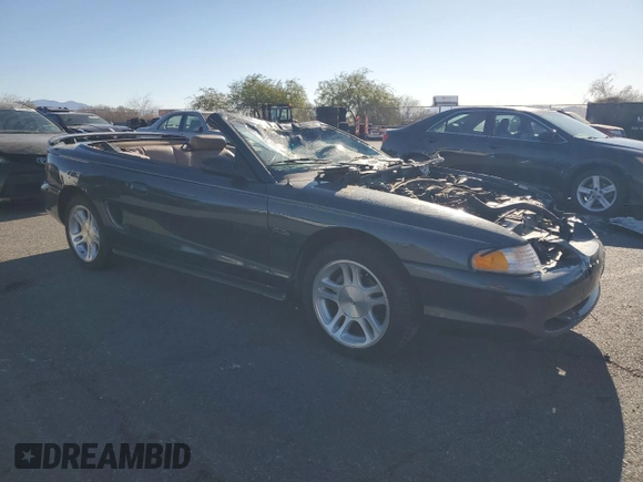 1998 Ford Mustang GT with VIN 1FAFP45X4WF216691, listed as a Copart auction lot 79389084 with 101,980 mi miles and Salvage Title. Bid and sale history available at carsss.com. Image 4.