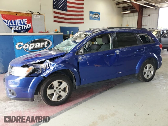 2012 Dodge Journey SXT with VIN 3C4PDDBG0CT260846, listed as a Copart auction lot 62384985 with 99,309 mi miles and Salvage title. Bid and sale history available at DreamBid. Image 1.