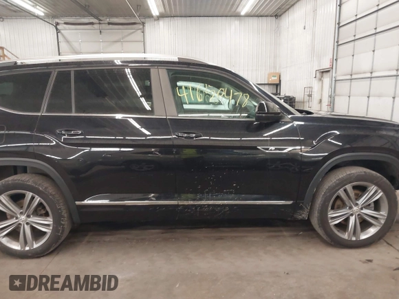 2018 Volkswagen Atlas SEL z VIN 1V2RR2CAXJC548261, wystawiony jako IAAI lot #41650478 z przebiegiem 123 399 mil mil oraz . Historia ofert i sprzedaży dostępna na DreamBid. Obrazek 14.