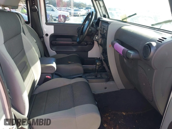 2007 Jeep Wrangler Unlimited X with VIN 1J4GB39147L199367, listed as a IAAI auction lot 40897772 with 229,309 mi miles and . Bid and sale history available at DreamBid. Image 5.