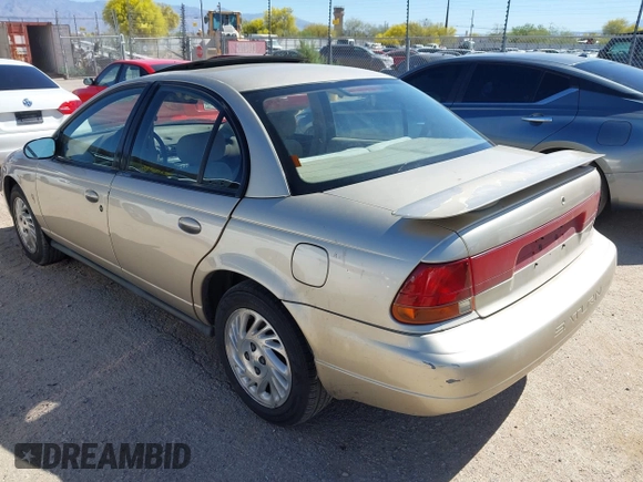 1998 Saturn SL z VIN 1G8ZK5271WZ129808, wystawiony jako IAAI lot #41993909 z przebiegiem 172 551 mil mil oraz . Historia ofert i sprzedaży dostępna na DreamBid. Obrazek 3.