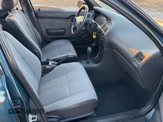1993 Geo Prizm z VIN 1Y1SK5365PZ054069, wystawiony jako Copart lot #84108844 z przebiegiem 82 611 mil mil oraz Tytuł czysty. Historia ofert i sprzedaży dostępna na DreamBid. Obrazek 5.