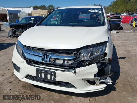 2019 Honda Odyssey LX with VIN 5FNRL6H23KB049236, listed as a IAAI auction lot 41633339 with 96,000 mi miles and . Bid and sale history available at DreamBid. Image 6.