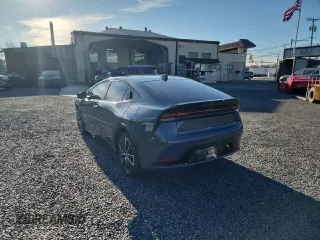 2024 Toyota Prius LE with VIN JTDADABU6R3012177, listed as a Copart auction lot 62894455 with 5,993 mi miles and Salvage title. Bid and sale history available at DreamBid. Image 2.