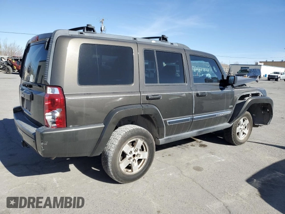 2006 Jeep Commander with VIN 1J8HH48K26C263986, listed as a Copart auction lot 84712294 with 216,923 mi miles and Salvage title. Bid and sale history available at DreamBid. Image 3.
