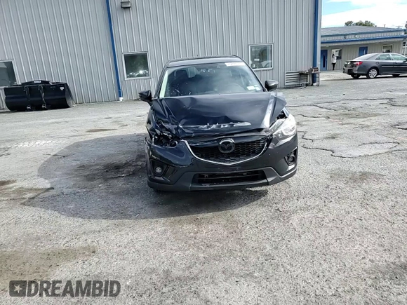 2015 Mazda CX-5 Grand Touring with VIN JM3KE4DY2F0480639, listed as a Copart auction lot 75248594 with 104,652 mi miles and Non Repairable. Bid and sale history available at carsss.com. Image 12.