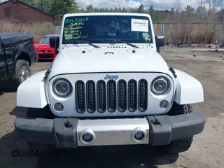 2015 Jeep Wrangler Unlimited Sahara with VIN 1C4HJWEG6FL556460, listed as a IAAI auction lot 42066648 with 54,747 mi miles. Bid and sale history available at carsss.com. Image 13.