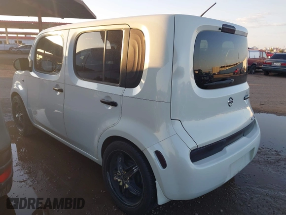 2009 Nissan Cube SL z VIN JN8AZ28R99T102860, wystawiony jako IAAI lot #42441475 z przebiegiem 151 466 mil mil oraz . Historia ofert i sprzedaży dostępna na DreamBid. Obrazek 3.