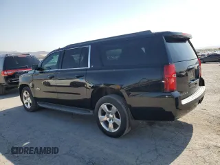 2015 Chevrolet Suburban LT with VIN 1GNSCJKC9FR732720, listed as a Copart auction lot 62564765 with 99,194 mi miles and Salvage title. Bid and sale history available at DreamBid. Image 2.