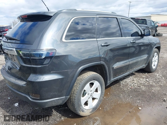 2011 Jeep Grand Cherokee Laredo with VIN 1J4RR4GG9BC723395, listed as a IAAI auction lot 42092022 with 86,226 mi miles and . Bid and sale history available at DreamBid. Image 4.
