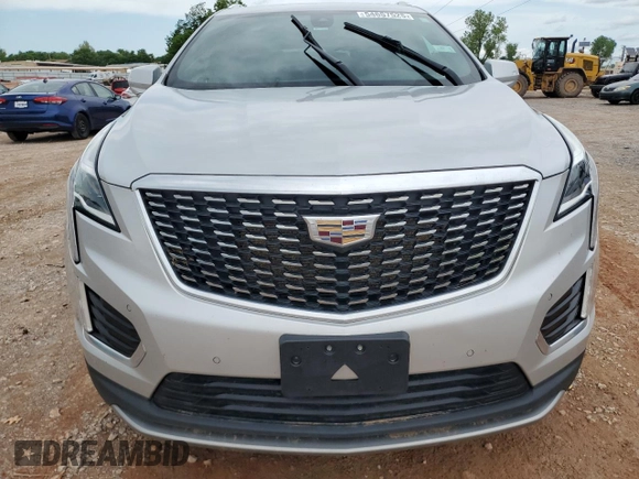 2020 Cadillac XT5 Premium Luxury FWD z VIN 1GYKNCRS1LZ191485, wystawiony jako Copart lot #54657525 z przebiegiem Nie podano mil oraz Szkoda całkowita • Salvage title. Historia ofert i sprzedaży dostępna na DreamBid. Obrazek 5.