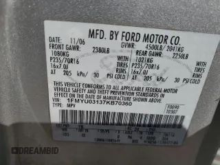 2007 Ford Escape XLT with VIN 1FMYU03137KB70360, listed as a Copart auction lot 70698654 with 114,353 mi miles and Non Repairable. Bid and sale history available at carsss.com. Image 13.