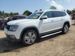 2018 Volkswagen Atlas SEL Premium z VIN 1V2NR2CAXJC539249, wystawiony jako Copart lot #55992035 z przebiegiem 132 814 mil mil oraz Szkoda całkowita • Salvage title. Historia ofert i sprzedaży dostępna na DreamBid. Obrazek 1.