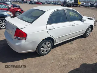 2009 Kia Spectra EX with VIN KNAFE221X95624138, listed as a IAAI auction lot 41823611 with 136,790 mi miles. Bid and sale history available at carsss.com. Image 4.