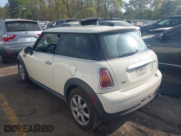 2007 MINI Hardtop with VIN WMWMF33587TT52466, listed as a IAAI auction lot 41964371 with 129,842 mi miles and . Bid and sale history available at DreamBid. Image 3.