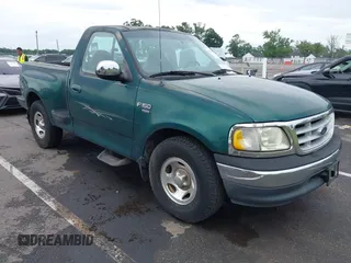 1999 Ford F-150 with VIN 2FTRF07W5XCB01716, listed as a IAAI auction lot 42681572 with 115,904 mi miles and . Bid and sale history available at DreamBid. Image 1.