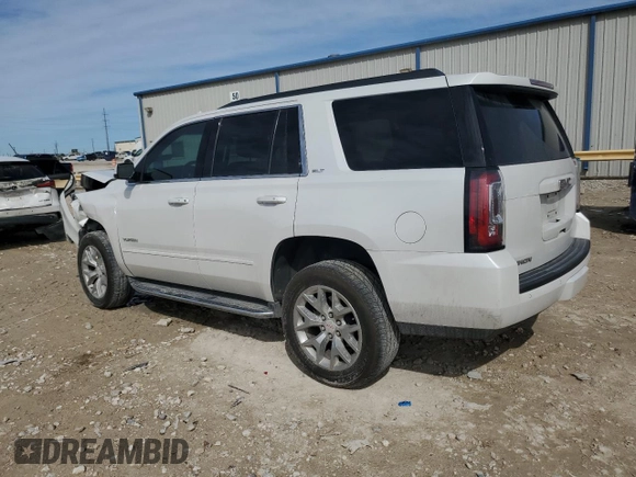 2019 GMC Yukon SLT with VIN 1GKS1BKC5KR329417, listed as a Copart auction lot 47275605 with 67,164 mi miles and Salvage Title. Bid and sale history available at carsss.com. Image 2.