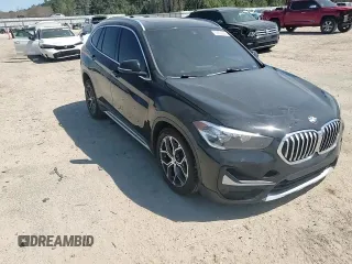 2021 BMW X1 xDrive28i z VIN WBXJG9C07M5S73464, wystawiony jako Copart lot #50374525 z przebiegiem 117 828 mil mil oraz Tytuł czysty. Historia ofert i sprzedaży dostępna na DreamBid. Obrazek 11.
