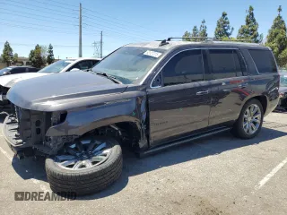 2017 Chevrolet Tahoe Premier with VIN 1GNSCCKC7HR241402, listed as a Copart auction lot 63127315 with 127,273 mi miles and Salvage title. Bid and sale history available at DreamBid. Image 1.