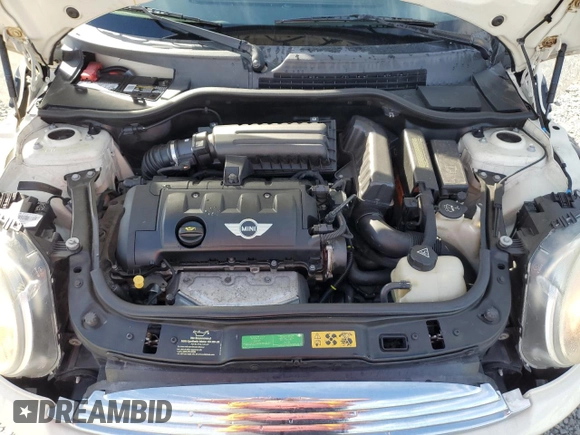 2010 MINI Convertible with VIN WMWMR3C55ATU97172, listed as a Copart auction lot 42726215 with 99,164 mi miles and Salvage Title. Bid and sale history available at DreamBid. Image 11.