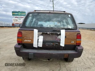1993 Jeep Grand Wagoneer z VIN 1J4GZ88Y6PC711184, wystawiony jako Copart lot #46785895 z przebiegiem 280 127 mil mil oraz Czysty tytuł • Clean title. Historia ofert i sprzedaży dostępna na DreamBid. Obrazek 6.