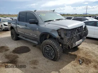 2015 Nissan Titan SL with VIN 1N6AA0ED5FN510723, listed as a Copart auction lot 60952184 with 177,435 mi miles and Salvage Title. Bid and sale history available at carsss.com. Image 4.