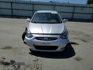 2013 Hyundai Accent GLS z VIN KMHCT4AE5DU416853, wystawiony jako Copart lot #57818195 z przebiegiem 84 550 mil mil oraz Szkoda całkowita • Salvage title. Historia ofert i sprzedaży dostępna na DreamBid. Obrazek 13.