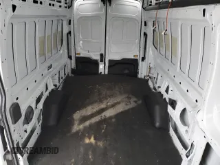 2023 Ford Transit Cargo z VIN 1FTBW3U82PKB65152, wystawiony jako Copart lot #43433405 z przebiegiem 6 128 mil mil oraz Szkoda całkowita • Salvage title. Historia ofert i sprzedaży dostępna na DreamBid. Obrazek 10.