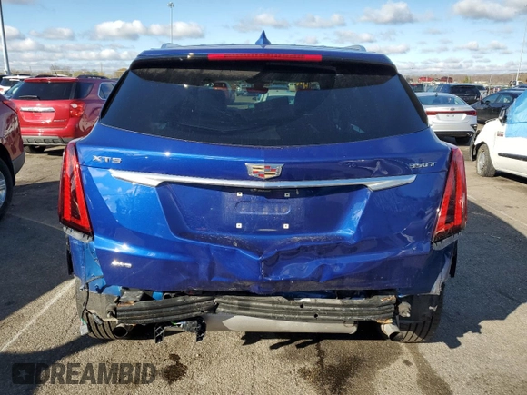 2023 Cadillac XT5 AWD Premium Luxury with VIN 1GYKNDR49PZ135890, listed as a Copart auction lot 79808584 with 21,708 mi miles and Salvage Title. Bid and sale history available at DreamBid. Image 6.