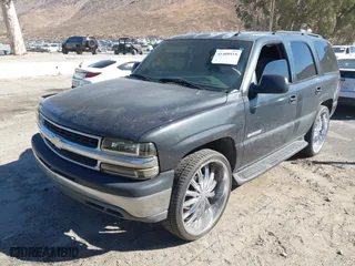 2003 Chevrolet Tahoe LT with VIN 1GNEC13T23R289916, listed as a IAAI auction lot 41408918 with 95,711 mi miles. Bid and sale history available at carsss.com. Image 2.