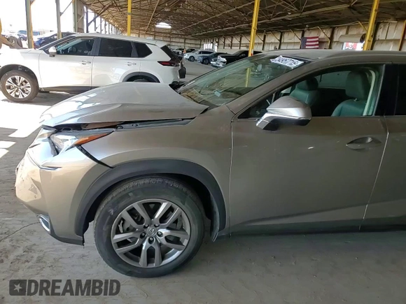 2016 Lexus NX 200t z VIN JTJYARBZ9G2039004, wystawiony jako Copart lot #54957715 z przebiegiem 93 631 mil mil oraz Szkoda całkowita • Salvage title. Historia ofert i sprzedaży dostępna na DreamBid. Obrazek 13.