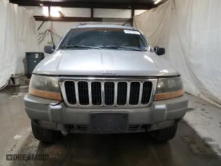 1999 Jeep Grand Cherokee Laredo with VIN 1J4GW58N0XC686845, listed as a Copart auction lot 48877805 with 155,908 mi miles and Clean Title. Bid and sale history available at carsss.com. Image 5.