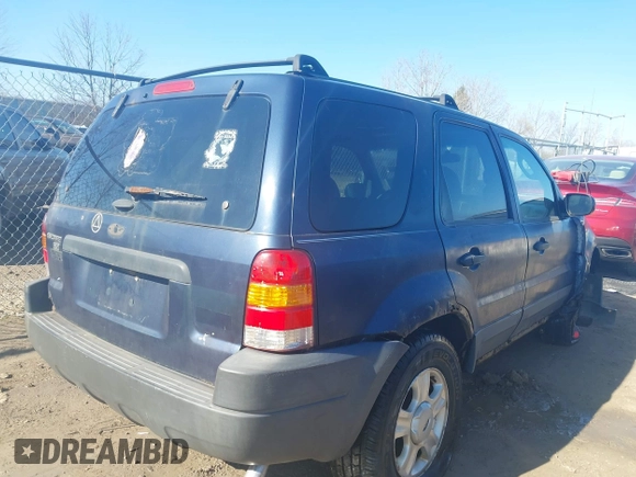 2003 Ford Escape XLT Popular with VIN 1FMYU03103KD07779, listed as a IAAI auction lot 42019919 with 245,522 mi miles. Bid and sale history available at carsss.com. Image 4.
