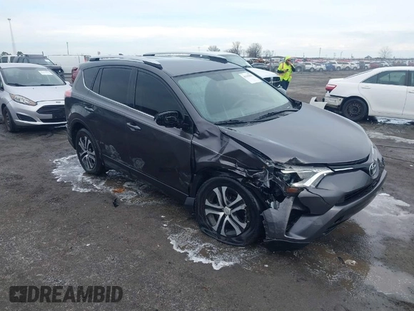 2016 Toyota RAV4 LE with VIN JTMZFREV5GJ093472, listed as a IAAI auction lot 41332037 with 212,869 mi miles. Bid and sale history available at carsss.com. Image 1.