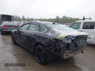 2014 Ford Fusion SE z VIN 3FA6P0H98ER161265, wystawiony jako IAAI lot #42312309 z przebiegiem 141 975 mil mil oraz . Historia ofert i sprzedaży dostępna na DreamBid. Obrazek 3.