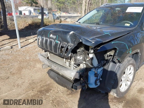 2019 Jeep Cherokee Latitude with VIN 1C4PJLCB6KD490529, listed as a IAAI auction lot 41890940 with 113,147 mi miles. Bid and sale history available at carsss.com. Image 6.
