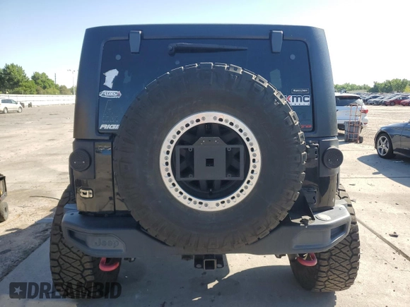 2016 Jeep Wrangler Unlimited Rubicon with VIN 1C4HJWFG3GL155092, listed as a Copart auction lot 62410365 with 82,231 mi miles and Salvage title. Bid and sale history available at DreamBid. Image 6.