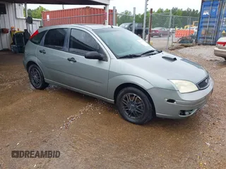 2006 Ford Focus S z VIN 1FAHP37N86W175318, wystawiony jako IAAI lot #42206785 z przebiegiem 220 401 mil mil oraz . Historia ofert i sprzedaży dostępna na DreamBid. Obrazek 1.