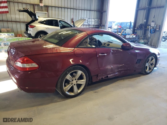 2009 Mercedes-Benz SL-Class V8 with VIN WDBSK71F29F142731, listed as a Copart auction lot 57281054 with 109,912 mi miles and Salvage Title. Bid and sale history available at carsss.com. Image 3.