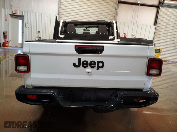 2023 Jeep Gladiator Sport S с VIN 1C6HJTAG0PL523306, выставлен на аукционе Copart как лот 59236535 с пробегом 64 185 миль миль и Списание • Salvage title. История ставок и продаж доступна на DreamBid. Изображение 6.